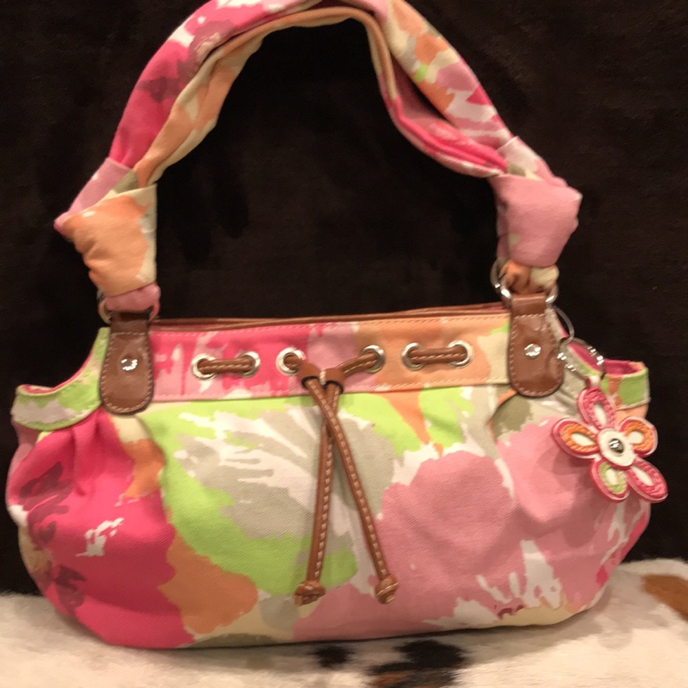 Women’s pink, floral print purse, with pocket for cell, and matching key ring.